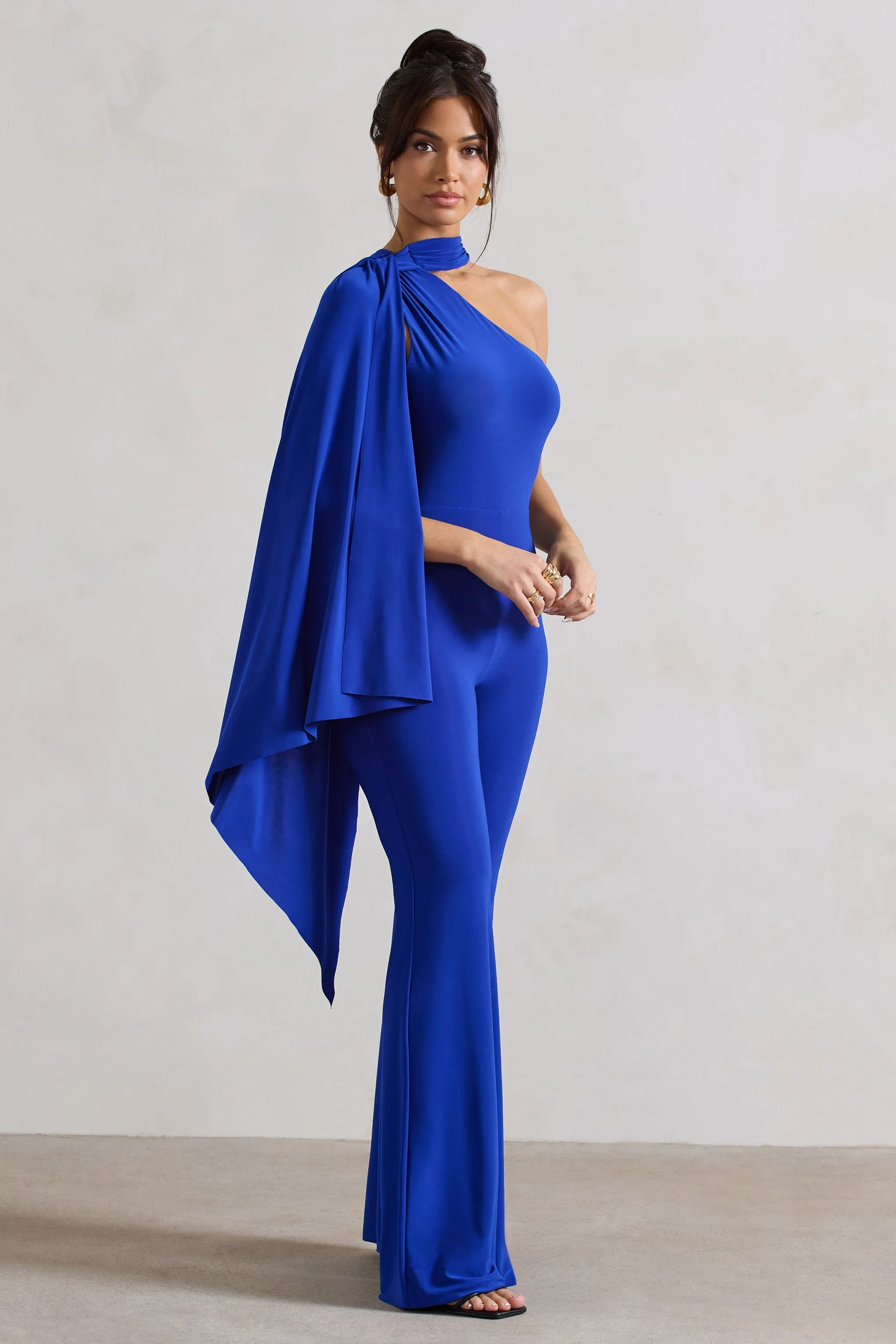 Offset | Royal Blue Asymmetric Flared-Leg Jumpsuit With Cape Sleeve