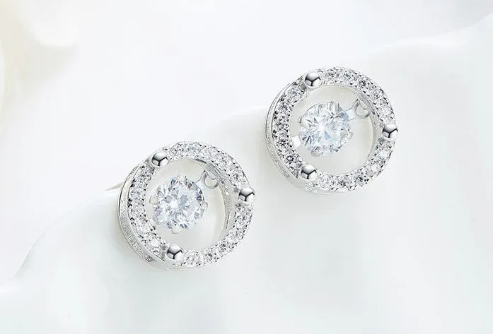 Sterling silver shiny circular dancing crystal earring